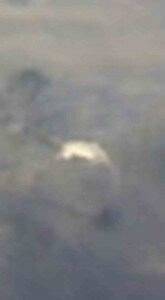 MATTHEW SWARTS A BLURRY IMAGE SHOWING A LIGHT-COLORED, INDISTINCT SHAPE AGAINST A GRAYISH, UNCLEAR BACKGROUND. THE SHAPE IS CENTRALLY LOCATED AND LACKS DETAIL, MAKING IT HARD TO IDENTIFY.