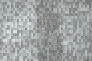 MATTHEW SWARTS A GHOSTLY HUMAN FIGURE OVERLAID WITH COLORFUL PIXEL BLOCKS AGAINST A GRAY PIXELATED BACKGROUND, BLENDING DIGITAL ABSTRACTION WITH A SEMI-TRANSPARENT HUMAN SILHOUETTE.