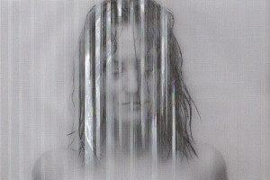 MATTHEW SWARTS A BLACK AND WHITE PORTRAIT OF A PERSONS FACE IS OBSCURED BY VERTICAL LINES, GIVING IT A GLITCHY, ABSTRACT APPEARANCE.