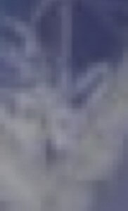 MATTHEW SWARTS A HIGHLY PIXELATED AND BLURRY IMAGE WITH MOSTLY BLUE AND GRAY TONES, MAKING IT DIFFICULT TO CLEARLY DISTINGUISH ANY OBJECTS OR SPECIFIC DETAILS.