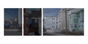 MATTHEW SWARTS TRIPTYCH OF RESIDENTIAL BUILDINGS WITH POWER LINES CRISSCROSSING THE SKY. THE LEFT PANEL SHOWS A BLUE TARP COVERING AN OBJECT IN A DRIVEWAY. THE MIDDLE PANEL DEPICTS A NARROW ALLEYWAY BETWEEN RED AND BLUE BUILDINGS. THE RIGHT PANEL FEATURES HOUSES OF VARYING COLORS WITH A WHITE PICKET FENCE.