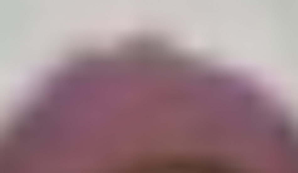 MATTHEW SWARTS A blurred image evocative of contemporary art, with predominantly pink and purple hues at the bottom, gradually fading to a light gray or white at the top. No clear shapes or objects are distinguishable in this visual art piece.