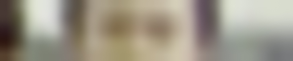 MATTHEW SWARTS A blurred image with soft tones of beige, pink, purple, and green captures the essence of fine art photography, making it difficult to distinguish any objects or details.