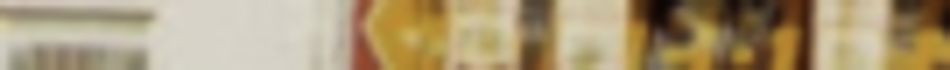 MATTHEW SWARTS A blurred image featuring vertical streaks of beige, orange, yellow, and brown blending together in an abstract pattern, characteristic of contemporary photographer Matthew Swarts' unique visual style.