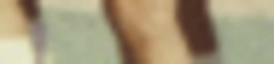 MATTHEW SWARTS A very blurry image with indistinct shapes and colors; primarily beige, green, and brown tones are visible. No clear objects or people can be identified, evoking a contemporary style that an abstract artist might appreciate.