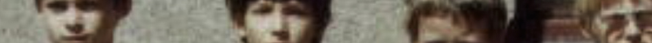MATTHEW SWARTS Four blurred, close-up images of faces arranged in a horizontal row against a neutral background. The facial features are indistinct, highlighting the photographer’s artistic approach and blurring the line between portraiture and art.