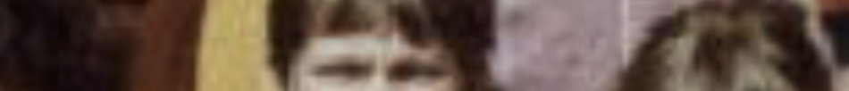 MATTHEW SWARTS The image is blurry and partially shows faces of two people, making it difficult to identify their features or surroundings—giving it an abstract feel often found in experimental photography or ART.