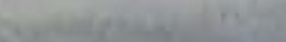 MATTHEW SWARTS A blurry, light gray and blue image with vertical streaks evokes a sense of abstract art, reminiscent of MATTHEW SWARTS’ unique PHOTOGRAPHER style. No distinct shapes or objects are visible, enhancing its foggy allure.