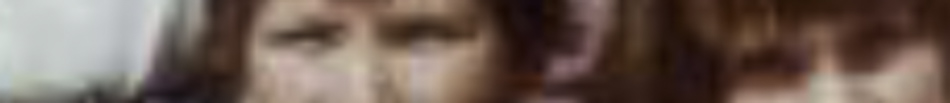 MATTHEW SWARTS A very blurry close-up image by photographer Matthew Swarts shows indistinct human faces with brown hair, making it hard to identify any facial features or expressions—an evocative piece of ART.