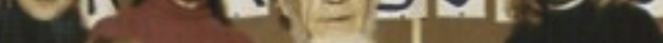 MATTHEW SWARTS A blurred image by artist Matthew Swarts showing several people standing in front of a background with round shapes and patterns. The details of their faces and clothing are not clearly visible.