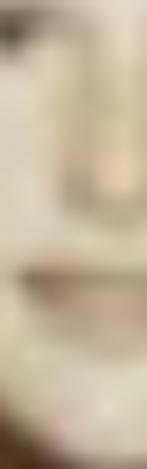 MATTHEW SWARTS A blurry close-up image showing part of a face, including the nose, mouth, and a portion of the cheek—capturing soft skin tones in a contemporary style reminiscent of modern art photography.