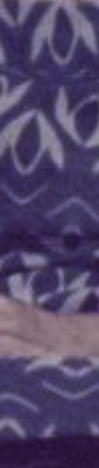MATTHEW SWARTS A close-up view of a purple fabric with white geometric and wavy patterns, featuring a horizontal band of light pink towards the bottom—an ART-inspired design reminiscent of an ARTIST like MATTHEW SWARTS.
