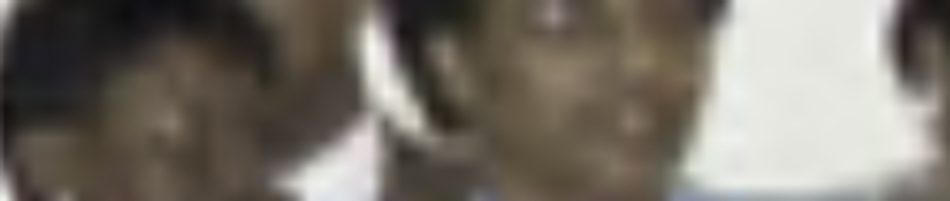 MATTHEW SWARTS A blurry image in the style of FINE ART PHOTOGRAPHY by MATTHEW SWARTS, showing several people standing close together, their facial features and expressions indistinct due to the low resolution.