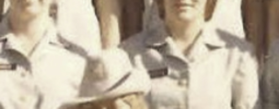 MATTHEW SWARTS A vintage, cropped photo in the style of contemporary art showing two people in light-colored uniforms and hats standing closely together. Their faces are partially visible, and the background is blurred—evoking Matthew Swarts’s unique approach to art.