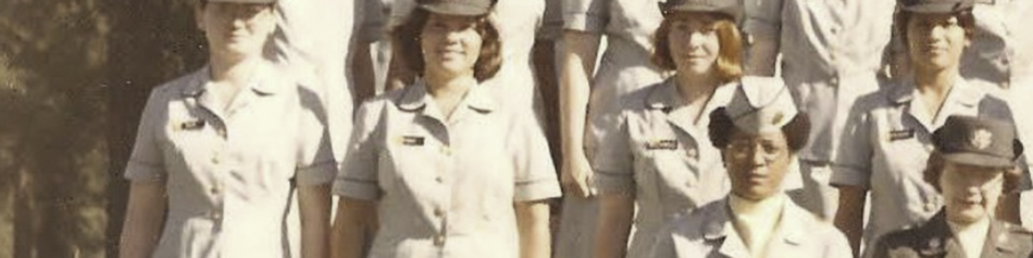 MATTHEW SWARTS A group of women in light-colored military uniforms and hats pose for a formal outdoor photograph, standing in rows—a striking example of FINE ART PHOTOGRAPHY inspired by the vision of MATTHEW SWARTS.