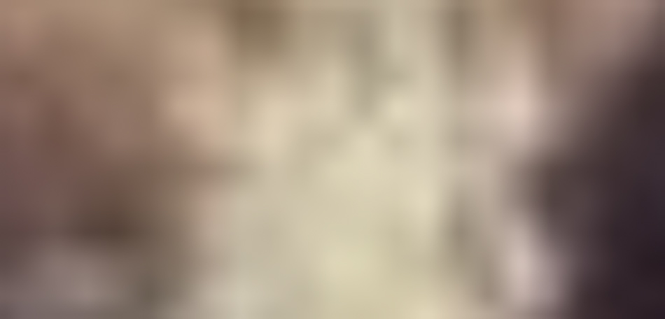 MATTHEW SWARTS A very blurry image with soft pink, beige, and brown tones blending together; no clear shapes or objects are distinguishable—a style reminiscent of FINE ART PHOTOGRAPHY by MATTHEW SWARTS.