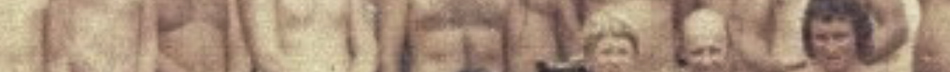 MATTHEW SWARTS A faded, sepia-toned photo by visual artist Matthew Swarts shows several children closely grouped together, their facial features blurred and indistinct.