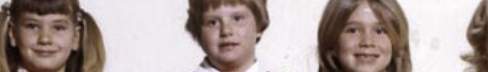 MATTHEW SWARTS Three children smiling, facing forward. This visual art image is cropped closely across their faces, showing the head and shoulders of each child—each with light brown or blond hair—against a white background.