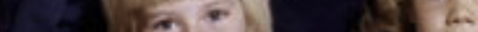 MATTHEW SWARTS A blurred, stretched image in the style of contemporary art shows partial faces with light skin and blonde hair against a dark background. The distortion, reminiscent of fine art photography by Matthew Swarts, makes facial features difficult to distinguish.