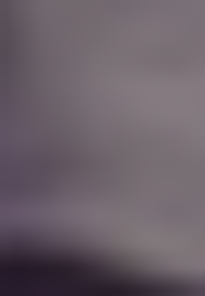 MATTHEW SWARTS A blurry image with a mix of muted purples and grays, creating an indistinct and abstract background reminiscent of fine art photography in the style of Matthew Swarts.