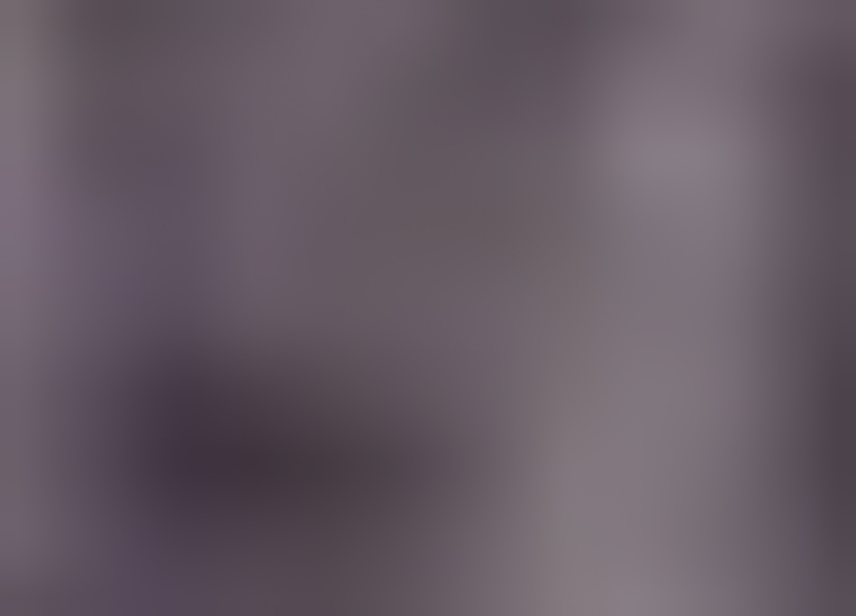 MATTHEW SWARTS A blurry, abstract image in shades of purple and gray, with no distinct shapes or objects visible, reminiscent of visual art by artist Matthew Swarts.